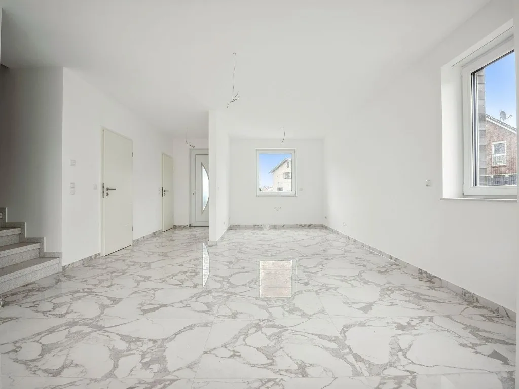 Living room with marble-effect floor tiles